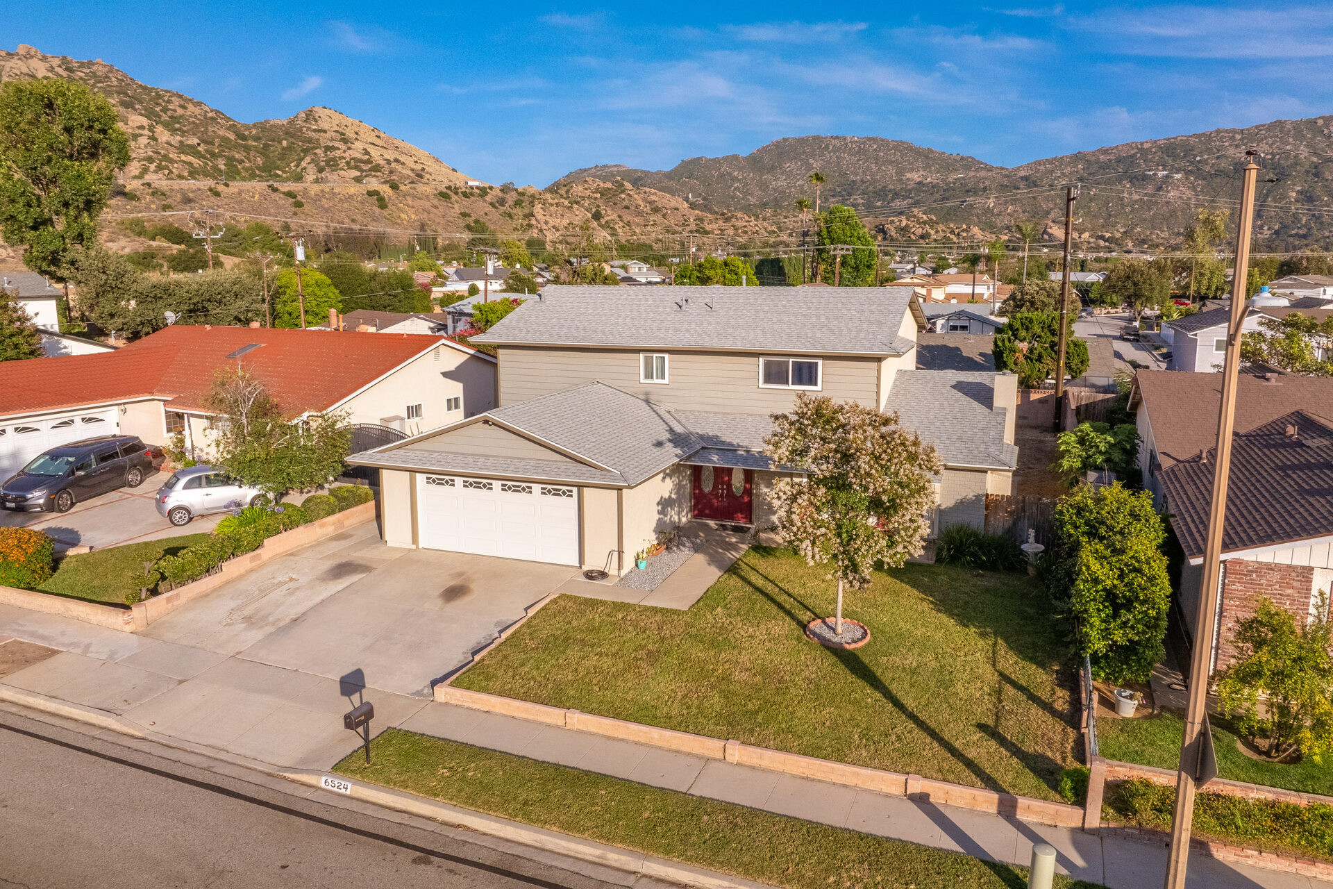 Aerial view of the property and neighborhood